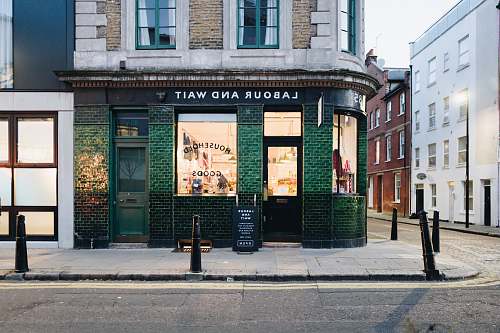 e2 7dj Labour And Wait green concrete storefront united kingdom